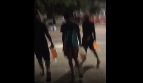 Em vídeo, criminosos aparecem com galões de gasolina ateando fogo em estação de ônibus