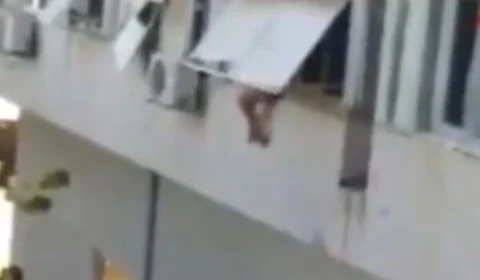 Desesperada, jovem pula do 3º andar de prédio para  fugir de traficantes sexuais; Veja vídeo