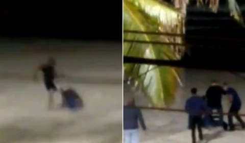Homem apanha de populares após espancar e pisar na própria mulher em praia