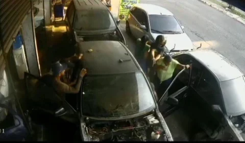 VEJA VÍDEO: imagens mostram o momento em que jovem é alvejado em borracharia