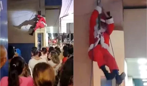 VEJA VÍDEO: Papai Noel desce de rapel, mas fica pendurado após se enroscar