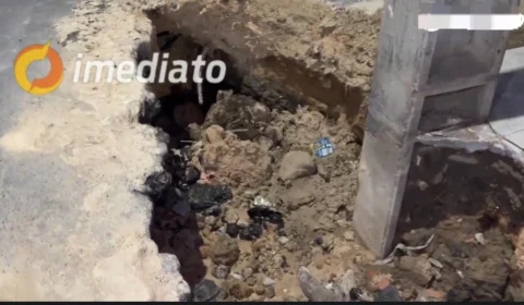 Buraco ameaça derrubar poste de energia no bairro Zumbi