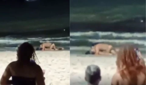 VÍDEO: Casal ignora multidão e desfruta de momento íntimo na praia de Maceió
