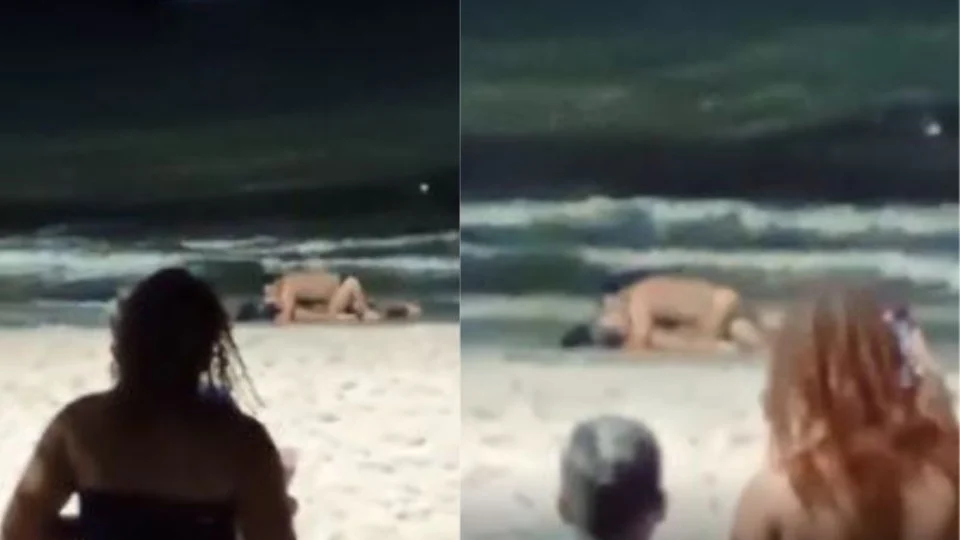 VÍDEO: Casal ignora multidão e desfruta de momento íntimo na praia de Maceió