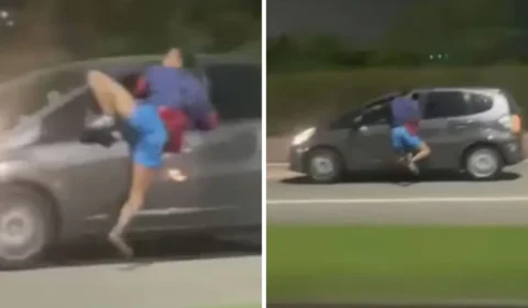 Veja Vídeo: motorista acelera e suposto assaltante fica pendurado em porta de carro