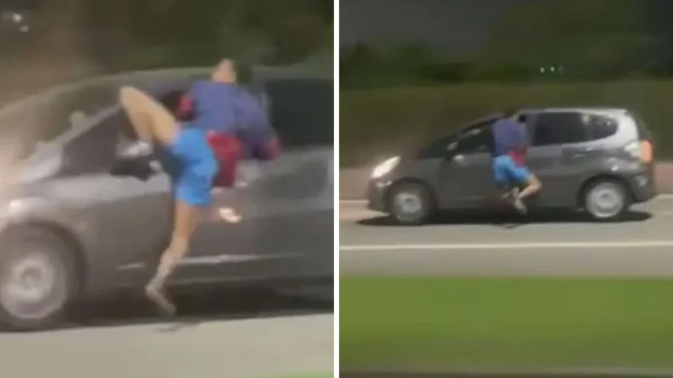 Veja Vídeo: motorista acelera e suposto assaltante fica pendurado em porta de carro