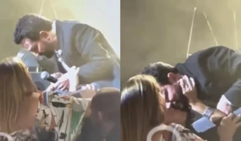 VEJA VÍDEO: Casado, Luciano Camargo recebe beijo na boca de fã durante show