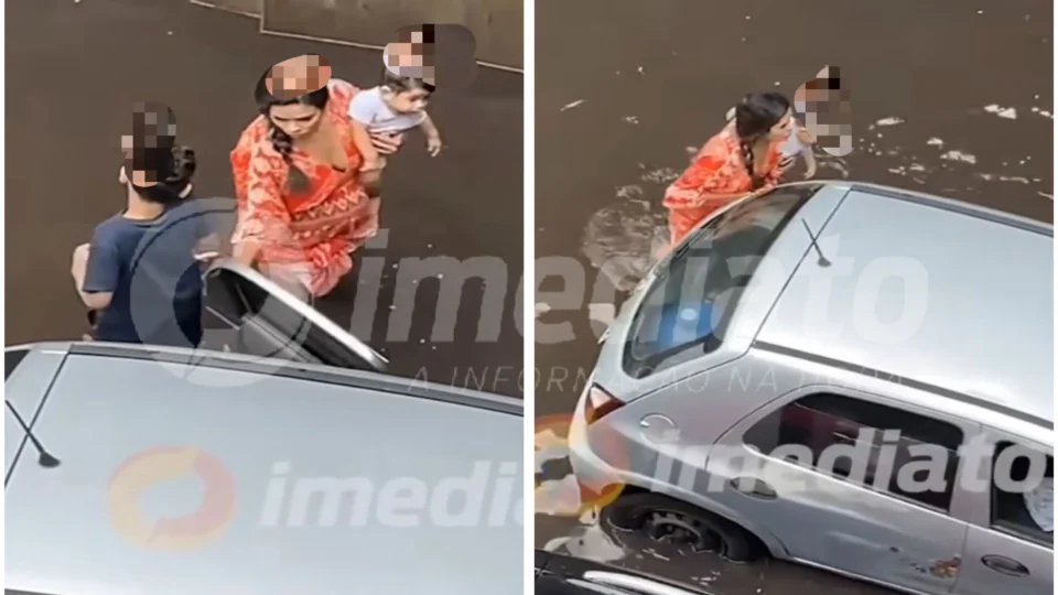 VEJA VÍDEO: mãe com bebê no colo tenta empurrar carro ‘ilhado’ na Avenida Efigênio Sales