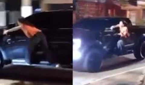 VEJA VÍDEO: mulher fica pendurada em carro após descobrir suposta traição do marido