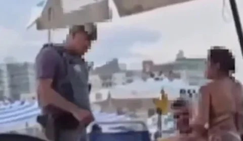 VEJA VÍDEO: casal ‘animadinho’ em praia é interrompido por policial