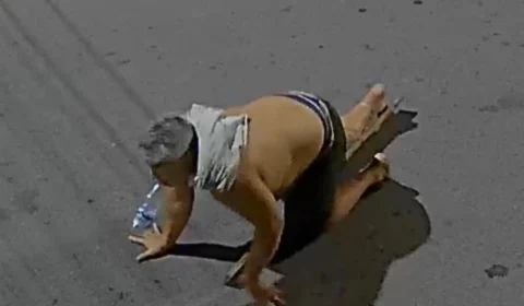 Câmeras flagram momento em que suspeito de duplo homicídio no Novo Aleixo cai ao tentar esconder arma