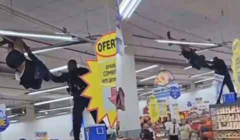Missão Impossível? homem fica pendurado no teto de supermercado no RJ;VEJA O VÍDEO
