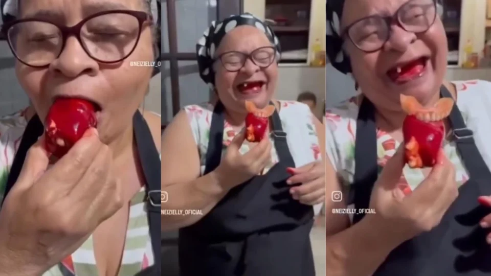 Morango do amor ou terror? Idosa viraliza após ter dentadura presa em morango do amor e diverte a internet