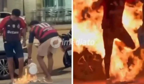 VÍDEO: Torcedores do Flamengo tentam queimar camisa do Palmeiras e acabam incendiando o próprio corpo