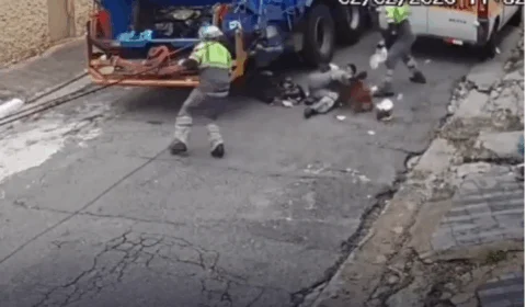 VEJA VÍDEO: pitbull arrebenta portão, ataca coletores e leva dois ao hospital