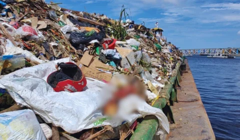 Imagens fortes: Perna humana é encontrada durante coleta de lixo na orla do Rio Negro, em Manaus