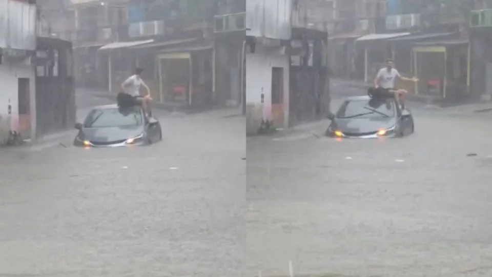 Motorista sobe no teto do carro ao ficar ilhado em alagamento durante forte chuva na zona sul de Manaus