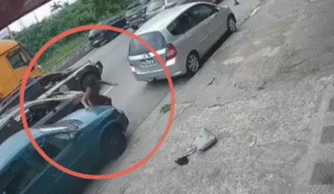 VÍDEO: Foragido da Justiça pula da janela de carro para tentar escapar da prisão
