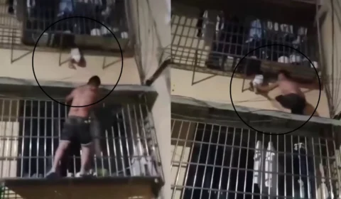Veja: Homem salva bebê que ficou pendurado pela cabeça em janela do 2º andar de apartamento na China