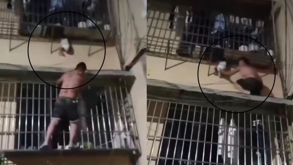 Veja: Homem salva bebê que ficou pendurado pela cabeça em janela do 2º andar de apartamento na China