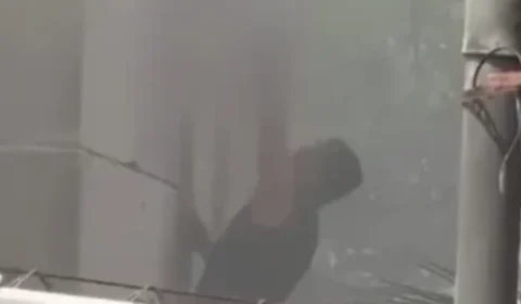 Bebê é retirado de prédio pela janela durante incêndio em Manaus